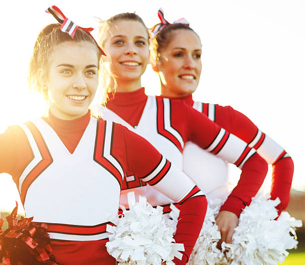 istock Happiness cheerleaders posing with pon-pon 507294658
