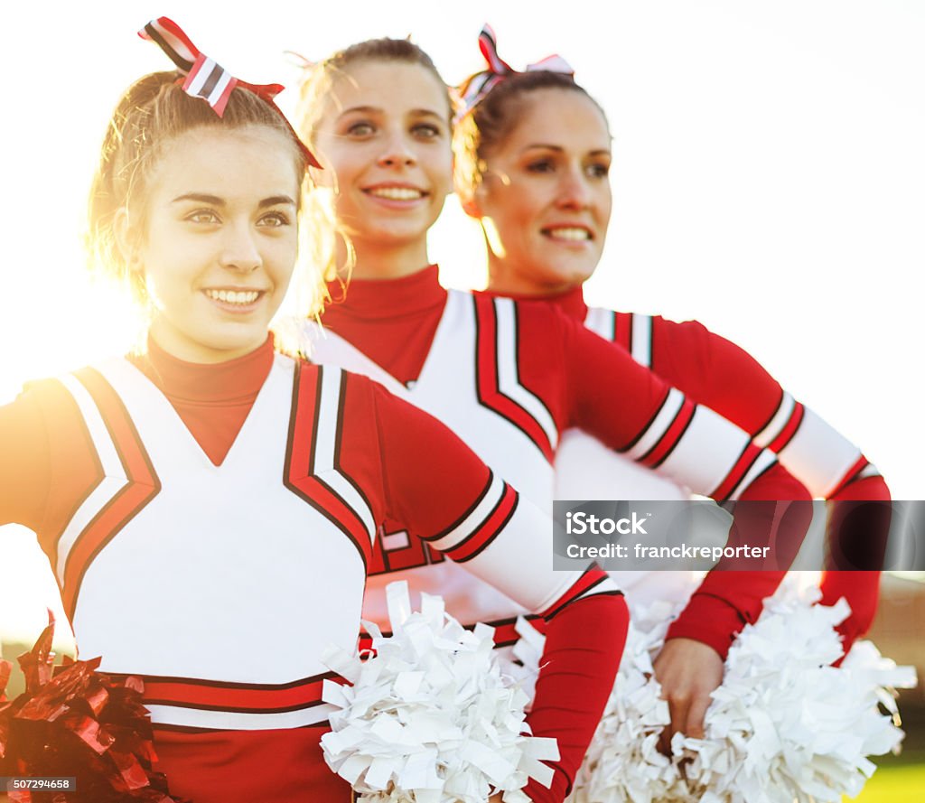 Happiness Cheerleaders Posing With Ponpon Stock Photo - Download Image Now  - Cheerleader, Teenager, Standing - iStock