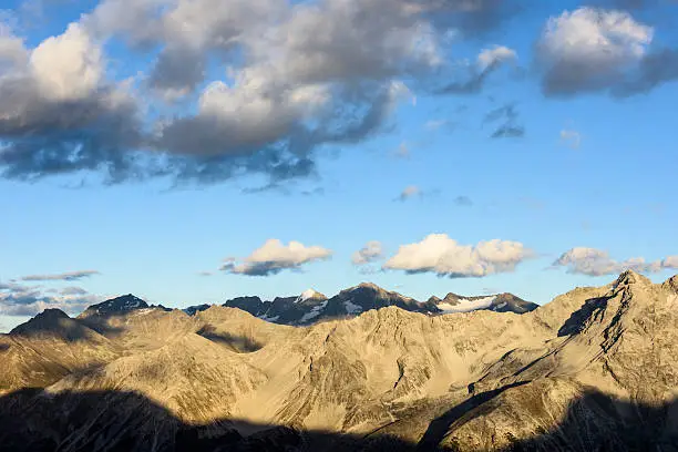 The mountain Vertainspitze (Italian: Cima Vertana; 3.545 m; middle) part of the Laaser mountains at sunset in the Ortler Alps in South Tyrol, Italy.