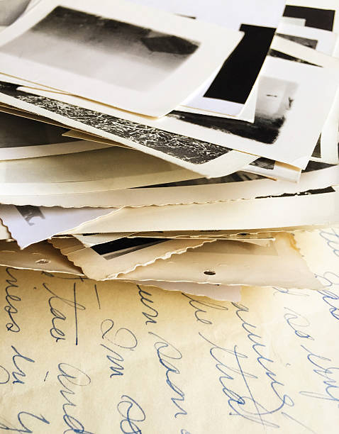 istock Old Photographs on Handwritten Letter 507297434