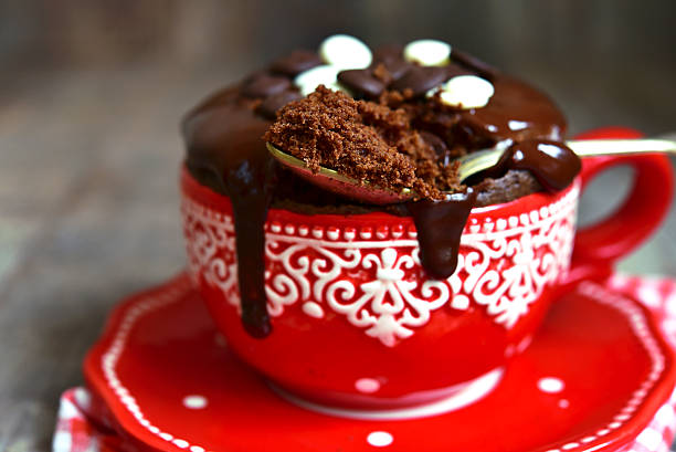 Chocolate mug cake. Chocolate mug cake decorated with chocolate glaze. torte photos stock pictures, royalty-free photos & images
