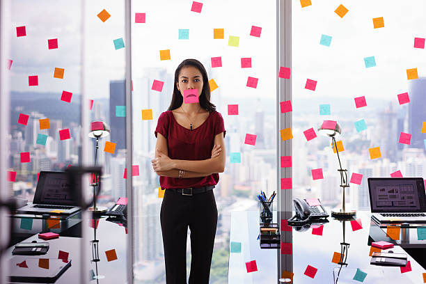 istock Frustrated Office Worker With Sad Emoticon On Mouth 507299820
