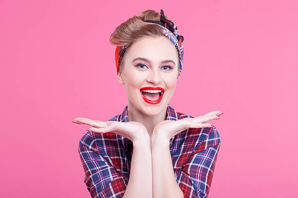 istock Pretty pin-up girl is gesturing positively 507300544