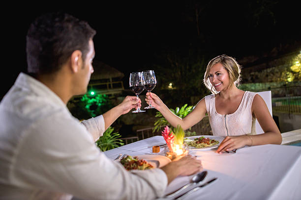 istock Couple making a toast in a romantic dinner 507301970