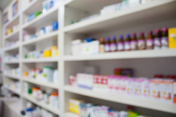 istock pharmacy store drugs shelves interior blurred background 507303462