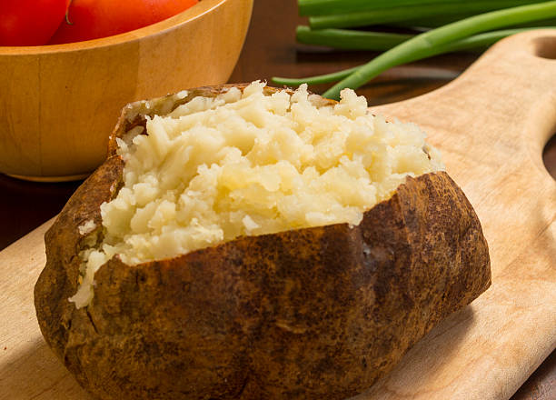 istock fresh hot baked potato 507312711
