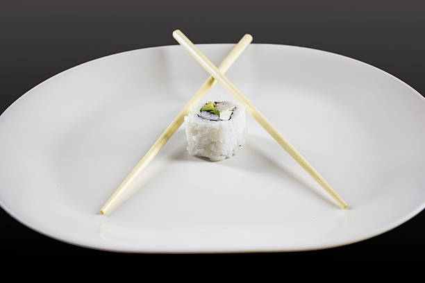 istock Philadelphia Roll Sushi with Chopsticks 507314733