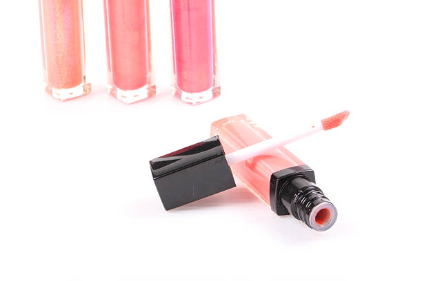 istock Pink lip gloss isolated on white 507314861