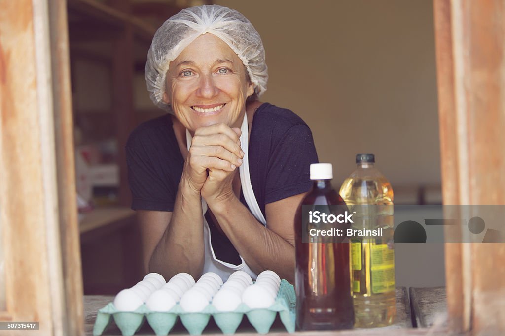 Woman Selling Eggs Active Seniors Stock Photo