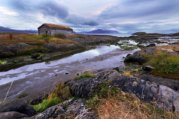 istock old house near a river 507316729
