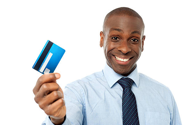 istock Cheerful executive holding credit card 507316899