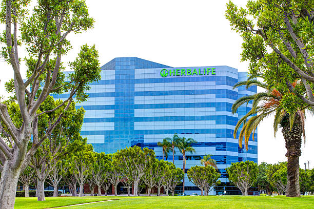 Herbalife Headquarters Building Carson, United States - August 2, 2014: Herbalife headquarters building. Herbalife International is a multi-level marketing company that sells nutrition, weight management and skin-care products. multi level marketing stock pictures, royalty-free photos & images