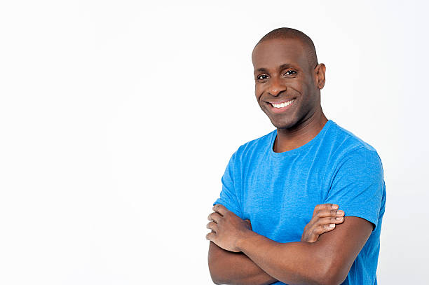 istock Casual man standing with crossed arms 507330215