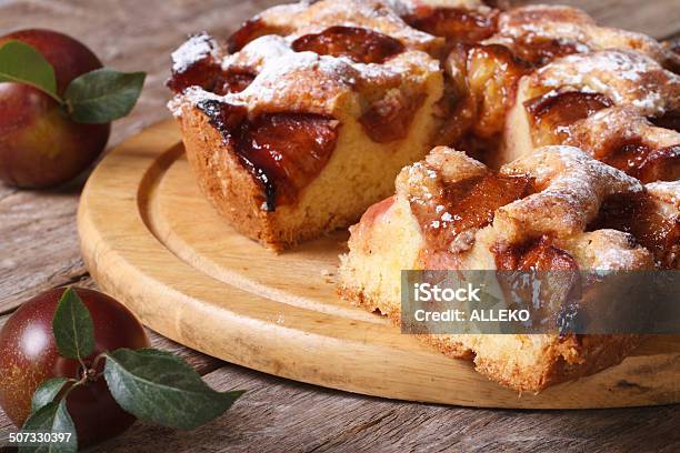 Sliced Plum Cake Close Up On Chopping Board Horizontal Stock Photo - Download Image Now