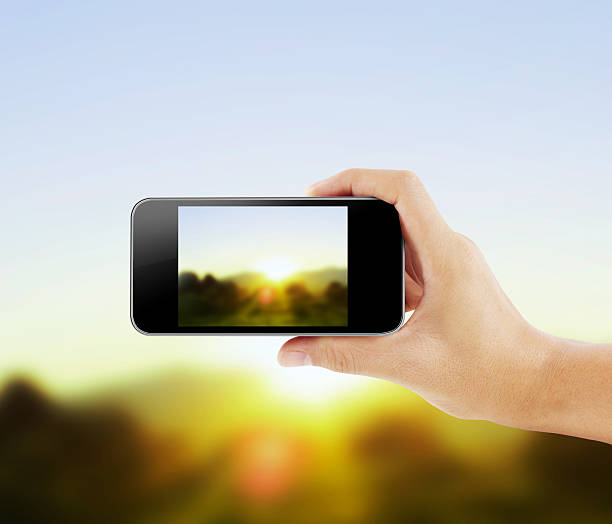 istock Hand holding smart phone 507330755