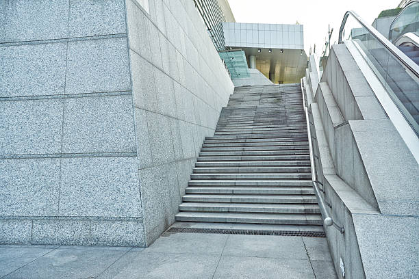 istock Granite stairs and concrete wall 507330931