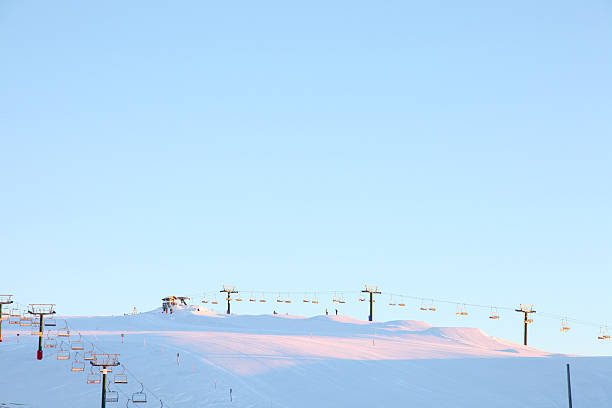 Ski lifts at sunset at Mt Hotham