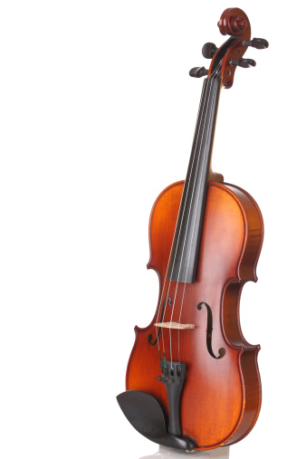 Close up of a violin on white background