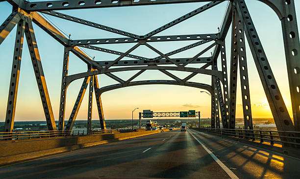 view of the Baton Rouge bridge on Interstate Ten view of the Baton Rouge bridge on Interstate Ten over the Mississippi River in Louisiana. baton rouge stock pictures, royalty-free photos & images