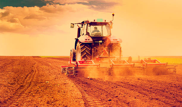 Farmer in tractor preparing land for sowing x pro look