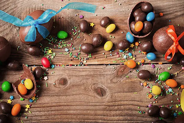 Chocolate Easter Eggs Over Wooden Background