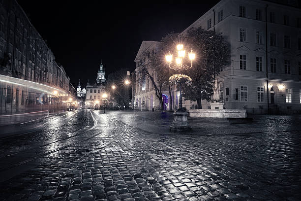 istock Old European city at night 507364810