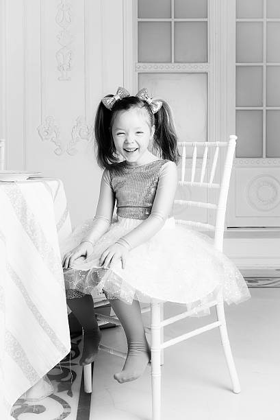 istock The girl sitting at the table 507367914