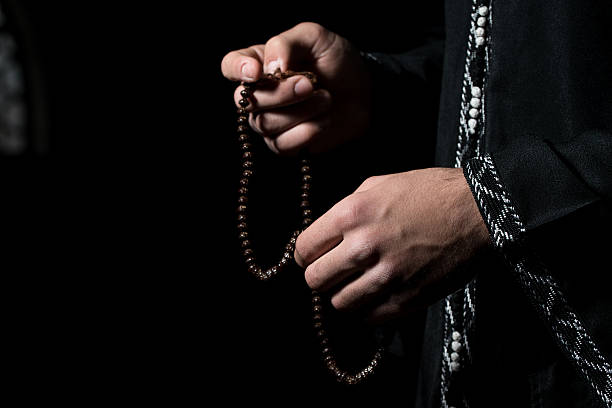 istock Male Hand With prayer beads 507370965