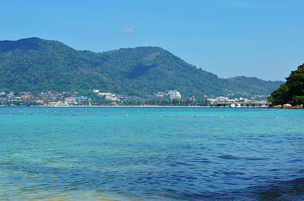 istock View of the sea, sky and mountains overgrown with jungle 507371920