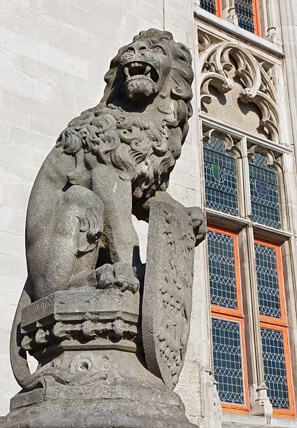 istock Bruges - lion statue before of Provincial hof building 507373125