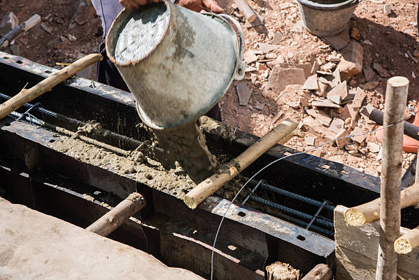 istock Concrete pouring during commercial concreting floors of buildings in construction 507373412