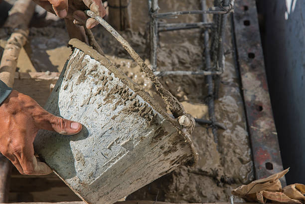 istock Concrete pouring during commercial concreting floors of buildings in construction 507374000