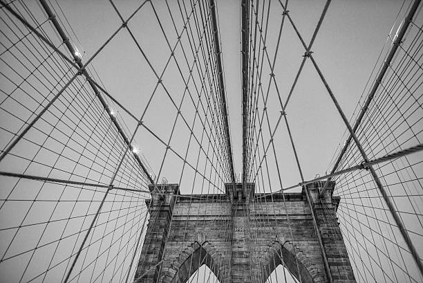 istock Cables and Pylon of Brooklyn Bridge with sunset light 507374351