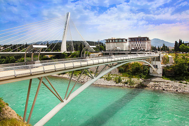 Podgorica Two modern susspension bridges on river Moraca in Podgorica, Montenegro podgorica stock pictures, royalty-free photos & images