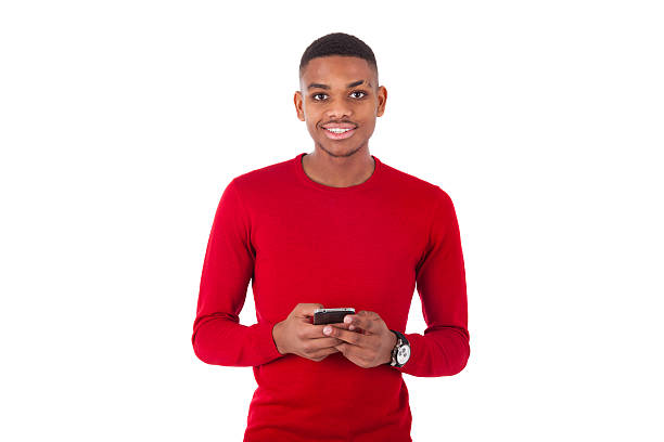 istock African American young man sending a text message 507375488