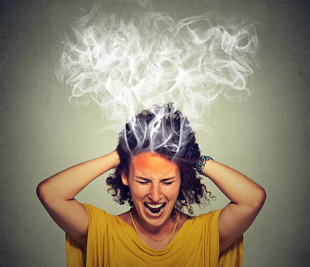 istock stressed woman screaming frustrated 507375530