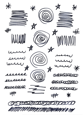 Hand drawn doodles, marks, scribbles, and squiggles. Design elements.