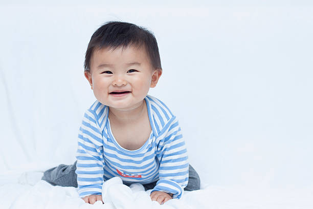 istock Cute Chinese baby boy in sailor suit 507378336