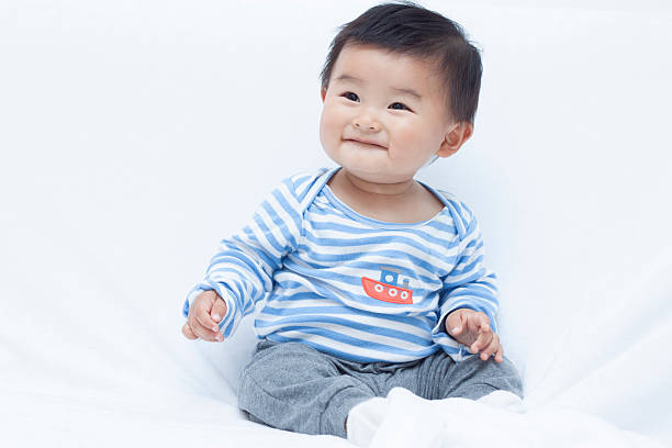 istock Cute Chinese baby boy in sailor suit 507378428