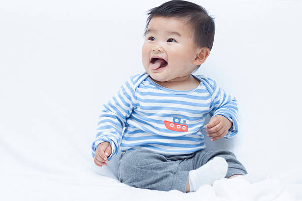 istock Cute Chinese baby boy in sailor suit 507378518