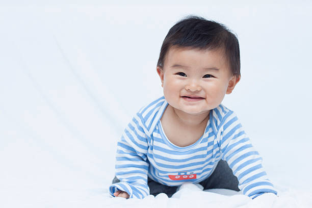 istock Cute Chinese baby boy in sailor suit 507395564