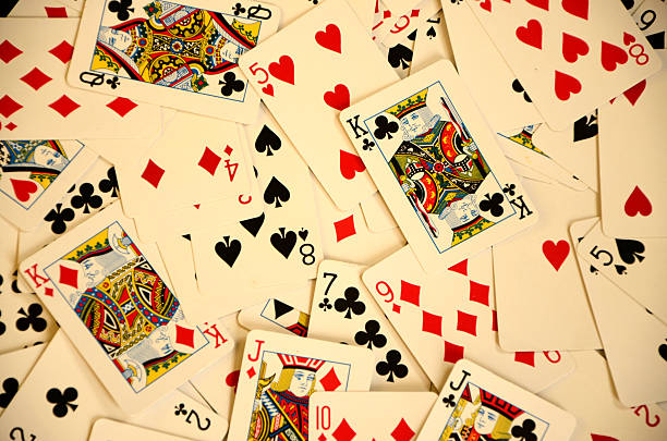 istock Overhead View of Playing Cards Background 507395970