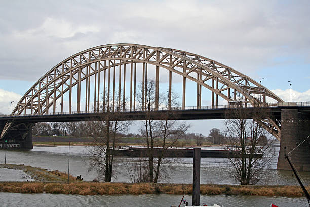 Netherlands: Waalbrug at Nijmegen Nijmegen, Netherlands - March 24, 2009: The Waalbrug in Nijmegen, an arch bridge that was an Allied target in Operation Market Garden and made famous by A Bridge Too Far. operation market garden stock pictures, royalty-free photos & images