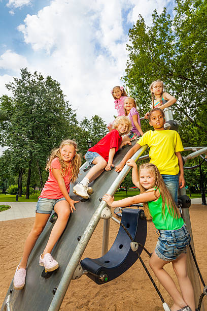 istock Children on playground construction play together 507396439