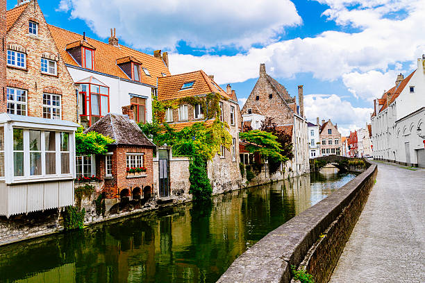 istock Bruges canal and houses, Belgium 507396469