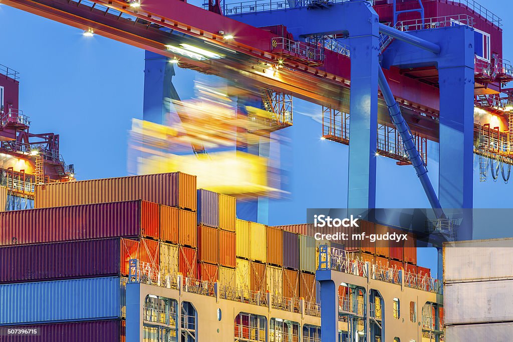 Unloading containers Hamburg harbour Cargo terminal. Freight Transportation Stock Photo