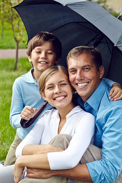 istock family under umbrella 507397555