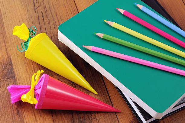 istock conical bag of sweets with book and crayons 507397910