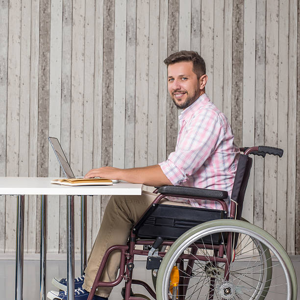 istock Disabled businessman working in an home office 507397988