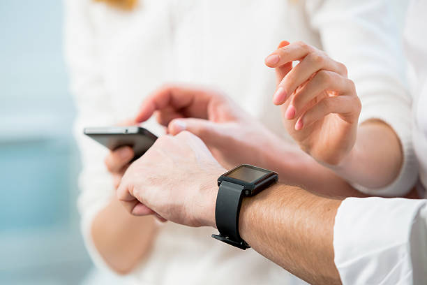istock Close up of man hands with smart watch 507398798